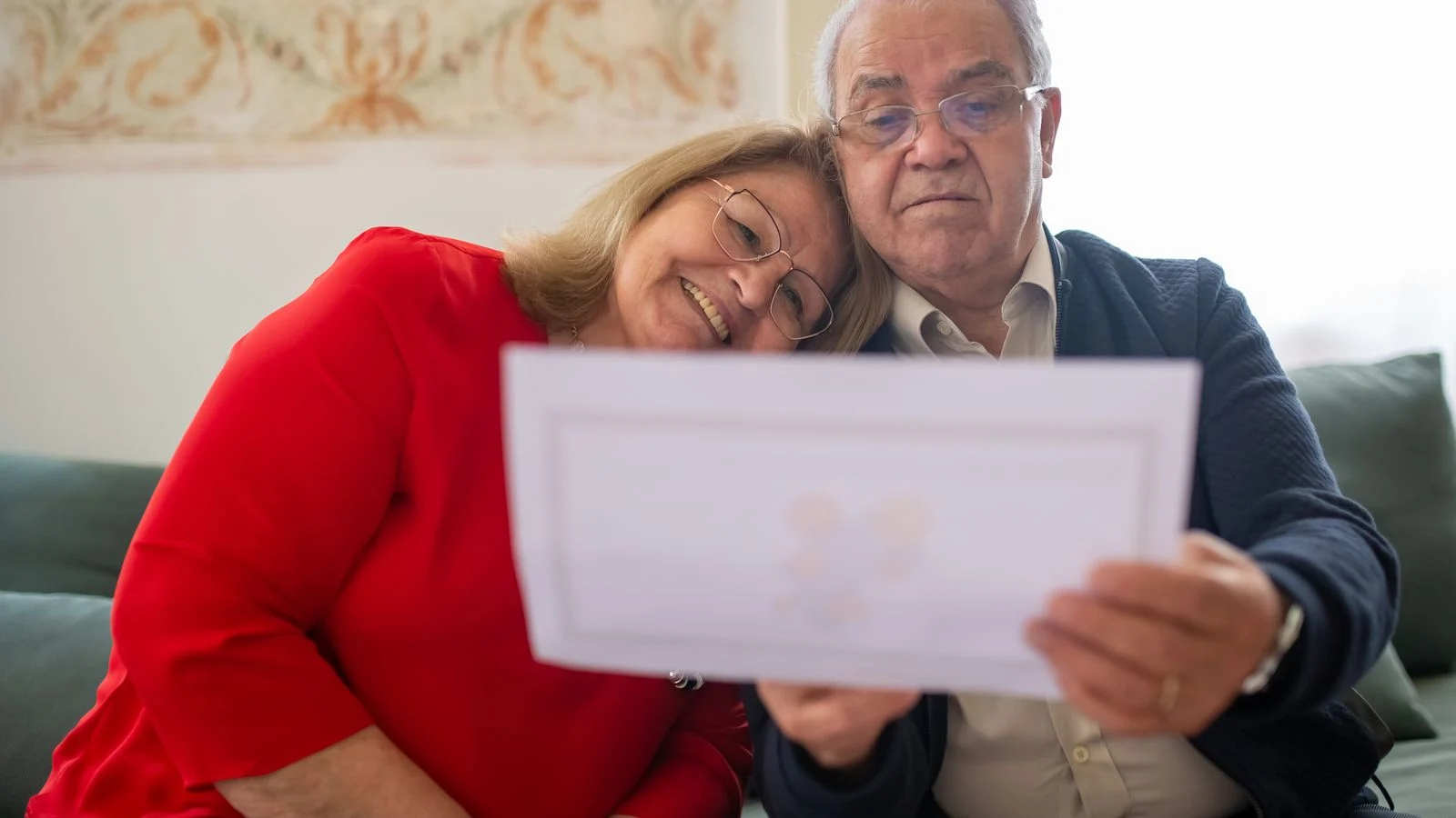 Florida senior couple reviewing their Medicare plan documents at home before the December 7 AEP deadline